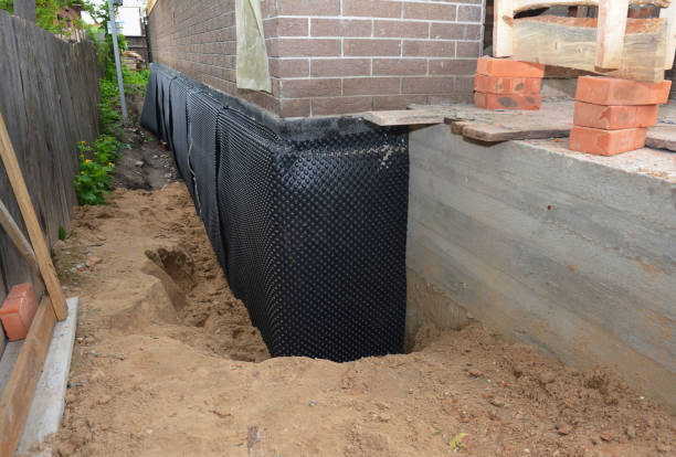 SJ Waterproofing Pros technician performing targeted Vapor Barrier Installation assessment in Walworth, WI